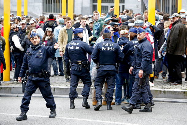 Belgian police officers escort students from Brussels university ULB/VUB at the occasion of the Saint Verhaegen day, the founder of the Brussels university, after security was tightened in Belgium following the fatal attacks in Paris on Friday, in Brussels, Belgium, November 20, 2015. REUTERS/Yves Herman